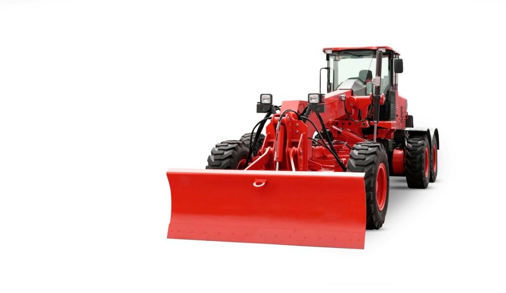 Red Modern three-axle Road Grader isolated on a white background.